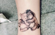 Sweet Little Winnie the Pooh Tattoo Done By Jon Atomic Tattoos