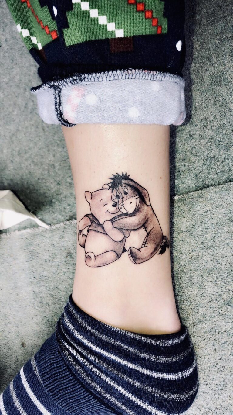 Sweet Little Winnie the Pooh Tattoo Done By Jon Atomic Tattoos 